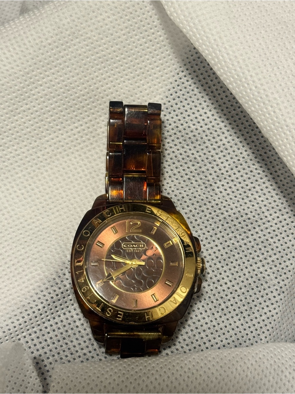 Coach leopard and Gold-Tone Bracelet Watch